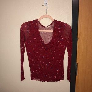 Large red floral long sleeve top with ruffle ends